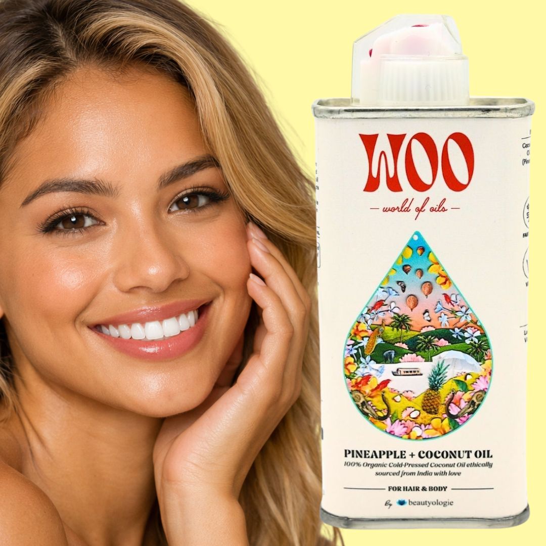 Smiling person with pineapple coconut oil product.