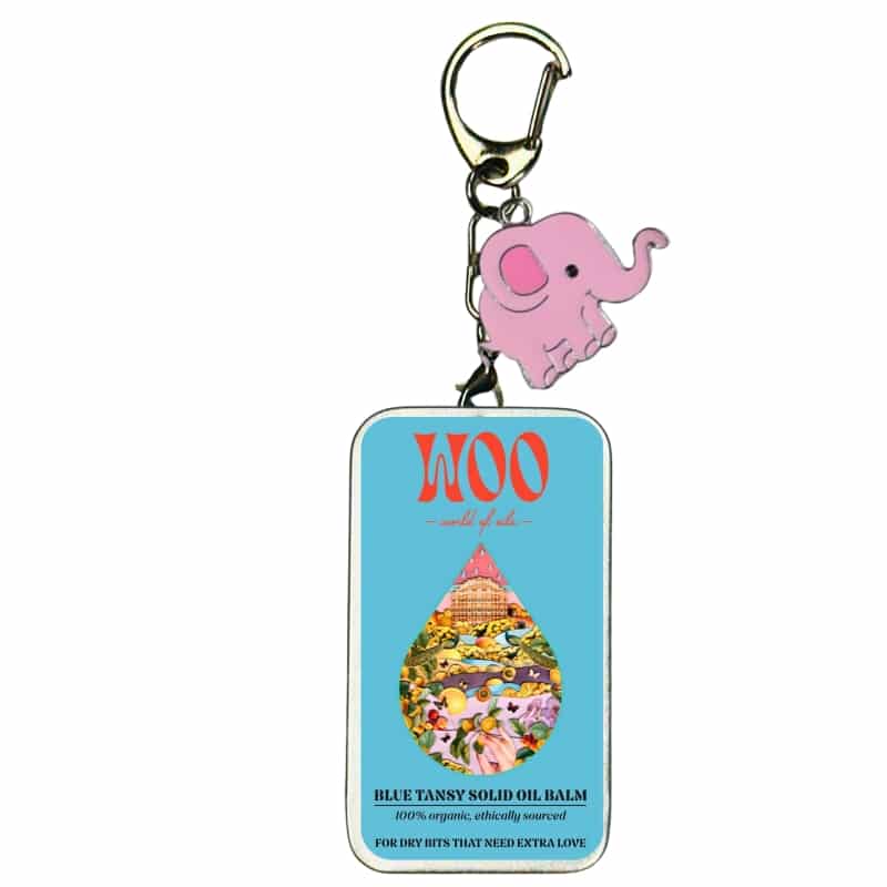 Pink elephant charm on oil balm keychain tag