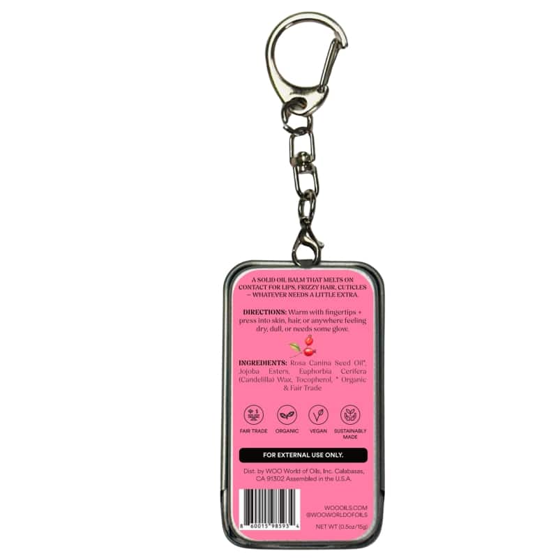 Pink-labeled solid oil balm keychain tin