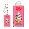 Pink rosehip oil can beside matching balm keychain